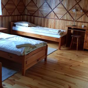 Ліжко або ліжка в номері Wincentówka - Realizujemy Bon Turystyczny
