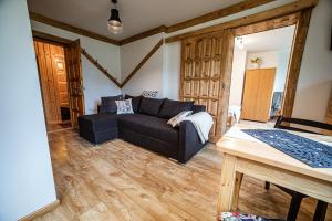 Posedenie v ubytovaní Apartament Stary Mlyn