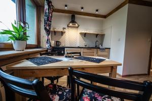 Posedenie v ubytovaní Apartament Stary Mlyn