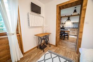 Kuchyňa alebo kuchynka v ubytovaní Apartament Stary Mlyn
