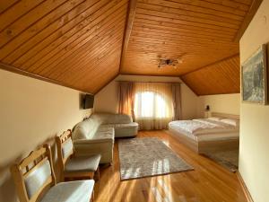 En eller flere senge i et værelse på Guest house Mountain View