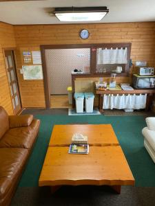 Posezení v ubytování Guest House Wind Inn Hakuba
