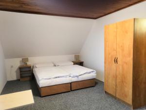 Postel nebo postele na pokoji v ubytování Horská chata U Rychlých Filipovice + 28 fotografií