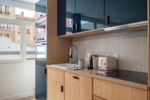Cucina o angolo cottura di NEW - Appt style le Corbusier avec Balcon - 8 pers