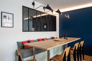 Foto dalla galleria di NEW - Appt style le Corbusier avec Balcon - 8 pers a Parigi