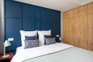 Letto o letti in una camera di NEW - Appt style le Corbusier avec Balcon - 8 pers