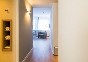 Uma área de estar em Brera Serviced Apartments Frankfurt Oper