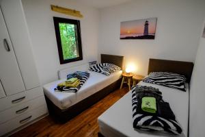 Posteľ alebo postele v izbe v ubytovaní Lee house, WI-FI,FREE PARKING, HOT TUBE + 37 fotografií