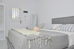 Postel nebo postele na pokoji v ubytování Kastraki Dunes Naxos