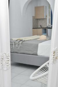Postel nebo postele na pokoji v ubytování Kastraki Dunes Naxos