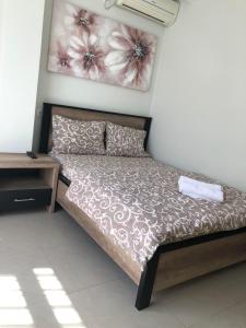 Postel nebo postele na pokoji v ubytování Apartmani Jovanovic
