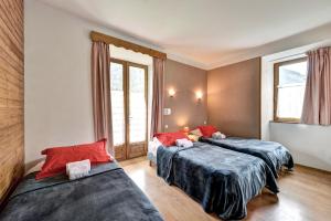 Postel nebo postele na pokoji v ubytování Hôtel Restaurant Gîtes Les 5 Saisons