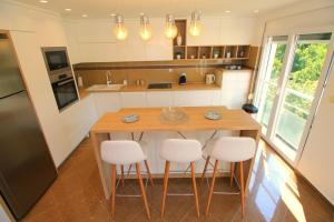 Kuchyň nebo kuchyňský kout v ubytování Lux Pržno View Penthouse