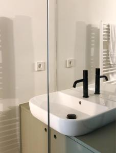 Koupelna v ubytování Gemütliche Wohnung im Herzen von Linz