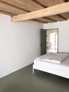 Postel nebo postele na pokoji v ubytování Gemütliche Wohnung im Herzen von Linz