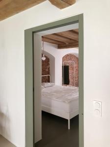 Postel nebo postele na pokoji v ubytování Gemütliche Wohnung im Herzen von Linz