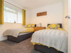 En eller flere senge i et værelse på Little Jack's