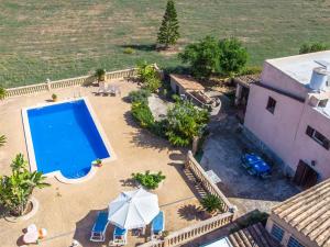 an aerial view of a house with a swimming pool at Holiday Home Can Josepot by Interhome in Alcudia