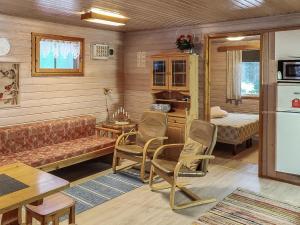 Kuchyň nebo kuchyňský kout v ubytování Holiday Home Kuusirinne by Interhome