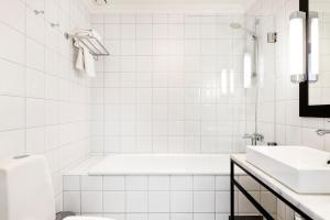Koupelna v ubytování Elite Hotel Savoy