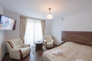 Postel nebo postele na pokoji v ubytování Marlen Sarbinowo