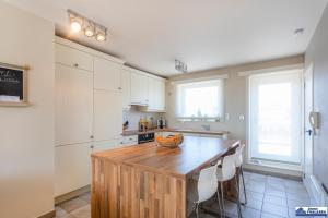 
A kitchen or kitchenette at Sunco 0401
