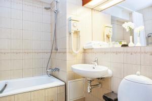 Koupelna v ubytování Elite Hotel Savoy