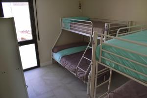 Posteľ alebo postele v izbe v ubytovaní ALBERGUE HOSTING DUERO