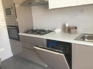 A kitchen or kitchenette at house231