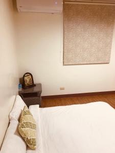 Postel nebo postele na pokoji v ubytování Grace House Homestay 2