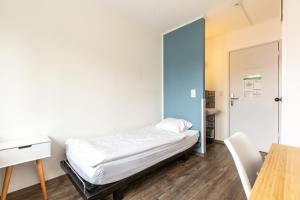 Postel nebo postele na pokoji v ubytování Hostel by Hyve Basel