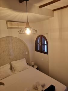 Un pat sau paturi într-o cameră la Relax Seaside House