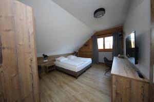 Karczma Szelągówka客房内的一张或多张床位
