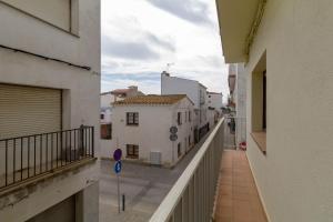 a view of an alley from a balcony of a building at PORT I Sistach Rentals in L'Estartit
