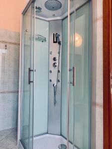 a shower with a glass door in a bathroom at Hotel San Giorgio in Albisola Superiore +62 photos