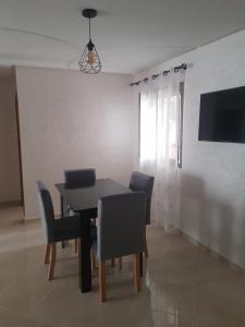 TV a/nebo společenská místnost v ubytování Résidence Machallah