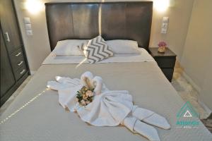 Postel nebo postele na pokoji v ubytování Hotel Atlantis