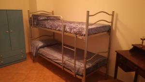 Postel nebo postele na pokoji v ubytování IL BUSSETO