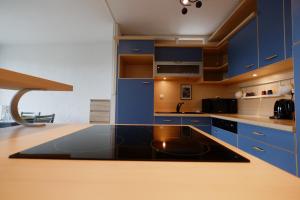 Majoituspaikan 70 m2 avec Balcons et Parking keittiö tai keittotila