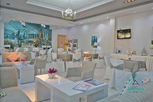 TV a/nebo společenská místnost v ubytování Hotel Atlantis + 23 fotografií