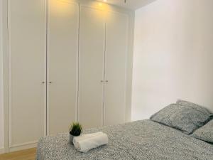 Llit o llits en una habitació de Moncloa-Arguelles nuevos pisos