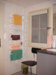 a kitchen with towels hanging on a wall at Chalet Petite Fleur in Adelboden