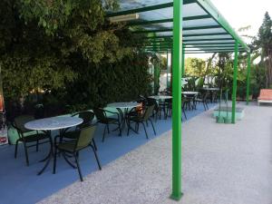 Reštaurácia alebo iné gastronomické zariadenie v ubytovaní Hotel Europa
