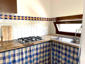 A kitchen or kitchenette at Villa Chiara