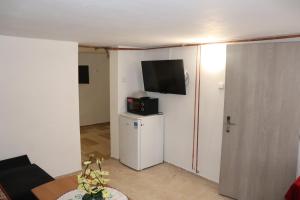 TV a/nebo společenská místnost v ubytování Hotel u Nádraží Lanžhot