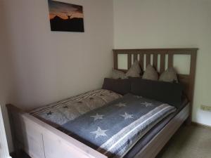 Postel nebo postele na pokoji v ubytování Ferienwohnung Sonthofenersee