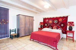 Postel nebo postele na pokoji v ubytování L'Agave, Salina