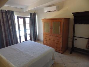 เตียงในห้องที่ Aruba Cunucu Residence