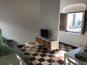TV a/nebo společenská místnost v ubytování Conil Homes III Apartments