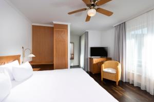 Precise Resort Rügen Apartments & SPLASH Erlebniswelt客房内的一张或多张床位